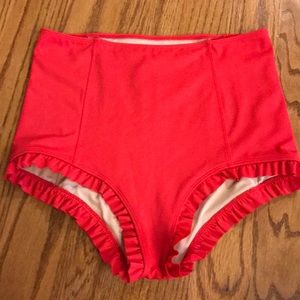 NWOT. kJ Ruffle around bottom. Size M.